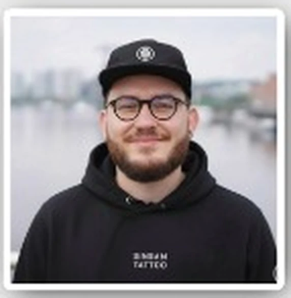 Sam, artist behind Sin Sam Tattoo in Temse